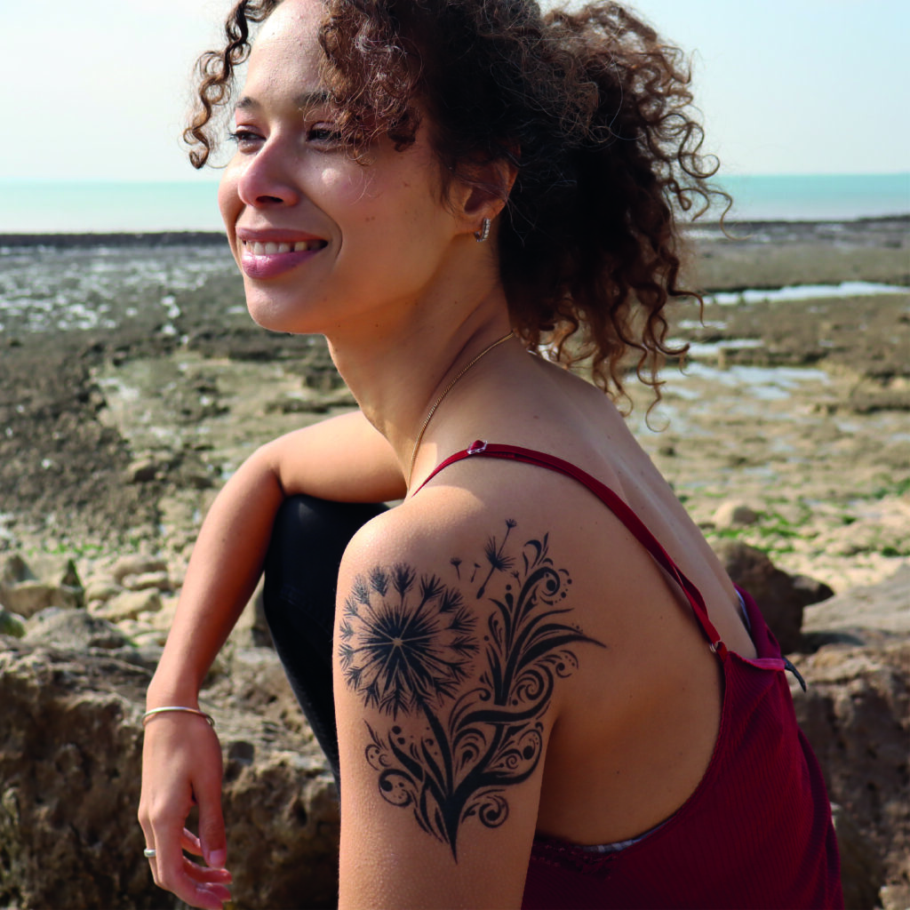 Tatouage représentant un Pissenlit
